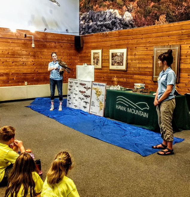 Education Trainees Diana and Alyssa host a Raptors Over the Ridge School Program in the Visitor Center