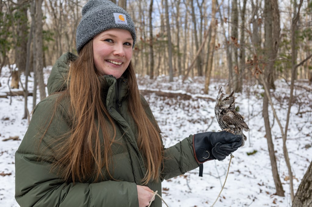 Megan Roselli with Eastern Screech Owl Education Bird